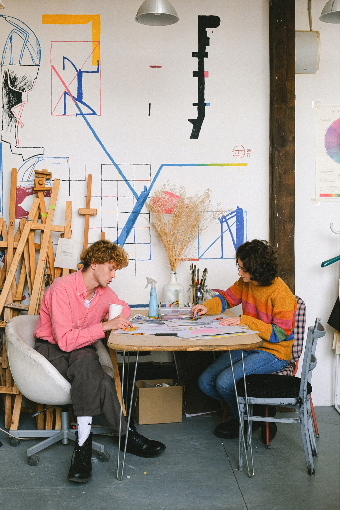The Fahami team working together on a project in the studio